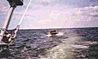 Windsurfers rescue boat - brought back from the deep!