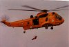 Sea King carrying out winching exercise